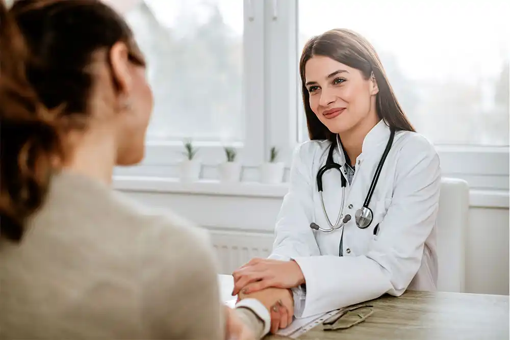 patient_3 Woman Shaking Hands with Doctor